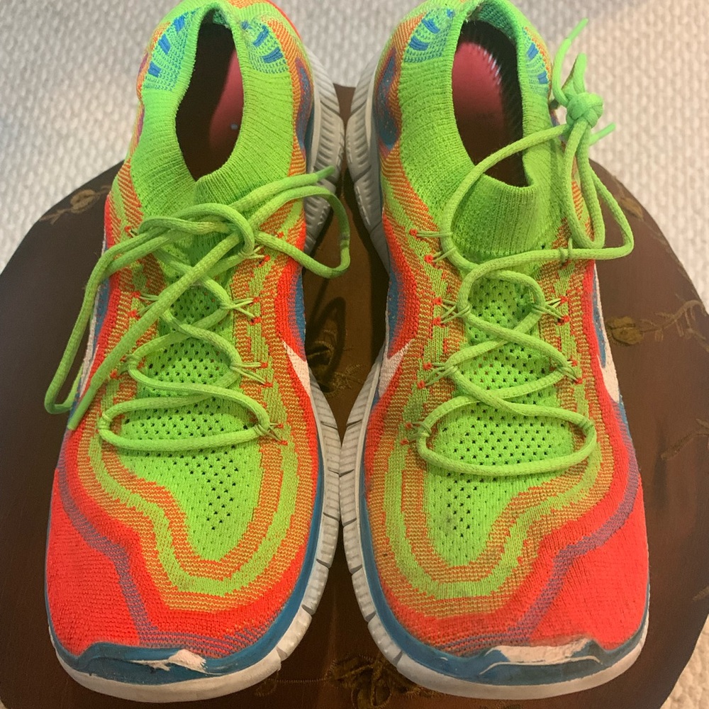 Neon Nike slip on sneakers